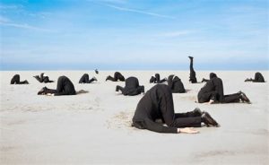 whitecollarheadinsand.jpg