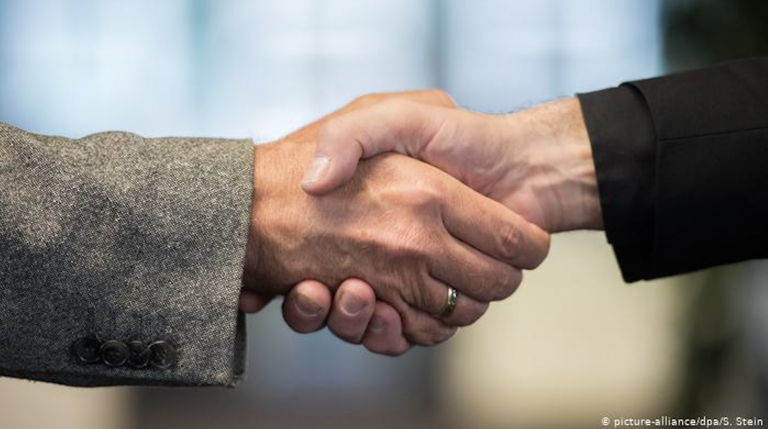 In Defence of the Handshake