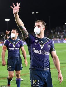 Melbourne Storm players masked.jpg