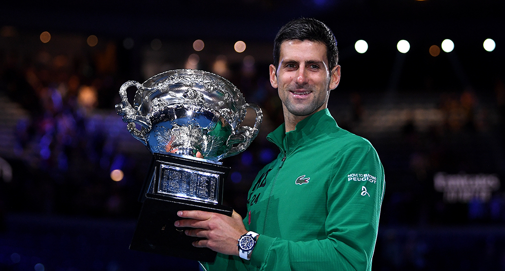 Novak Djokovic of Serbia poses for a photograph with the Norman Brookes Challenge Cup after winning the men's singles final on day 14 of the Australian Open tennis tournament at Rod Laver Arena in Melbourne, Sunday, February 2, 2020. (AAP Image/Lukas Coch) NO ARCHIVING, EDITORIAL USE ONLY ** STRICTLY EDITORIAL USE ONLY, NO COMMERCIAL USE, NO BOOKS **
