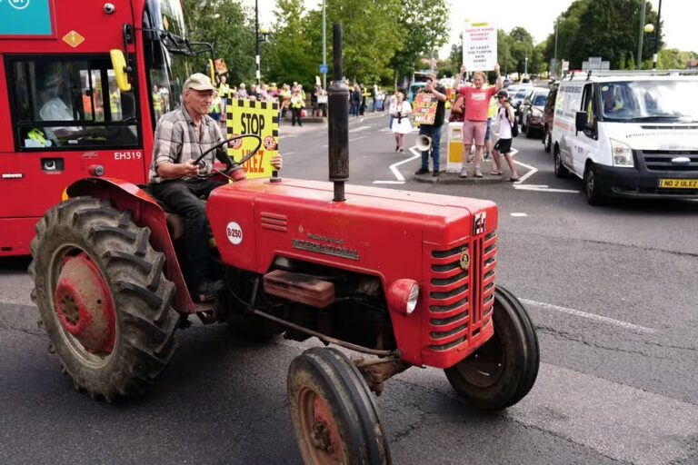 Ulez Protest Featuring Tractors and Three-Wheel Car Brings Traffic to a Standstill