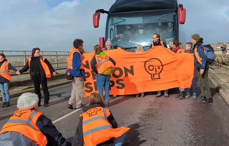 Just Stop Oil Blocks Coach Carrying Migrants to Bibby Stockholm Barge Claiming They Are Victims of Climate Change