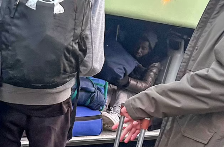 Stunned Children Return From School Trip to France to Find Two Migrants in Luggage Compartment of Coach
