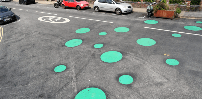 Green Council Branded “Absolutely Insane” After Painting Green Spots on Road to “Calm Traffic”