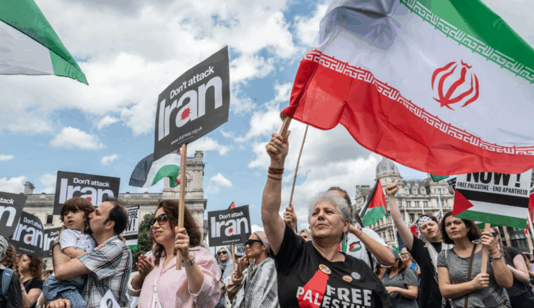 Pro-Palestine Protesters March Through London Waving Iranian Flags