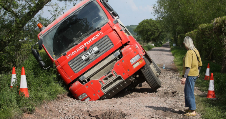 Pothole Repair Lorry Swallowed by Pothole it Was Sent to Fix