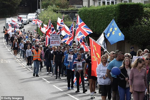Protesters March in Crowborough After Former Military Base Becomes Asylum Camp for 540 Male Migrants