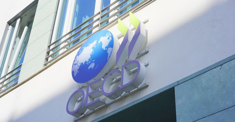 OECD Risks US Wrath by Pushing Ahead With Climate Finance Despite Washington Calling Time on Net Zero